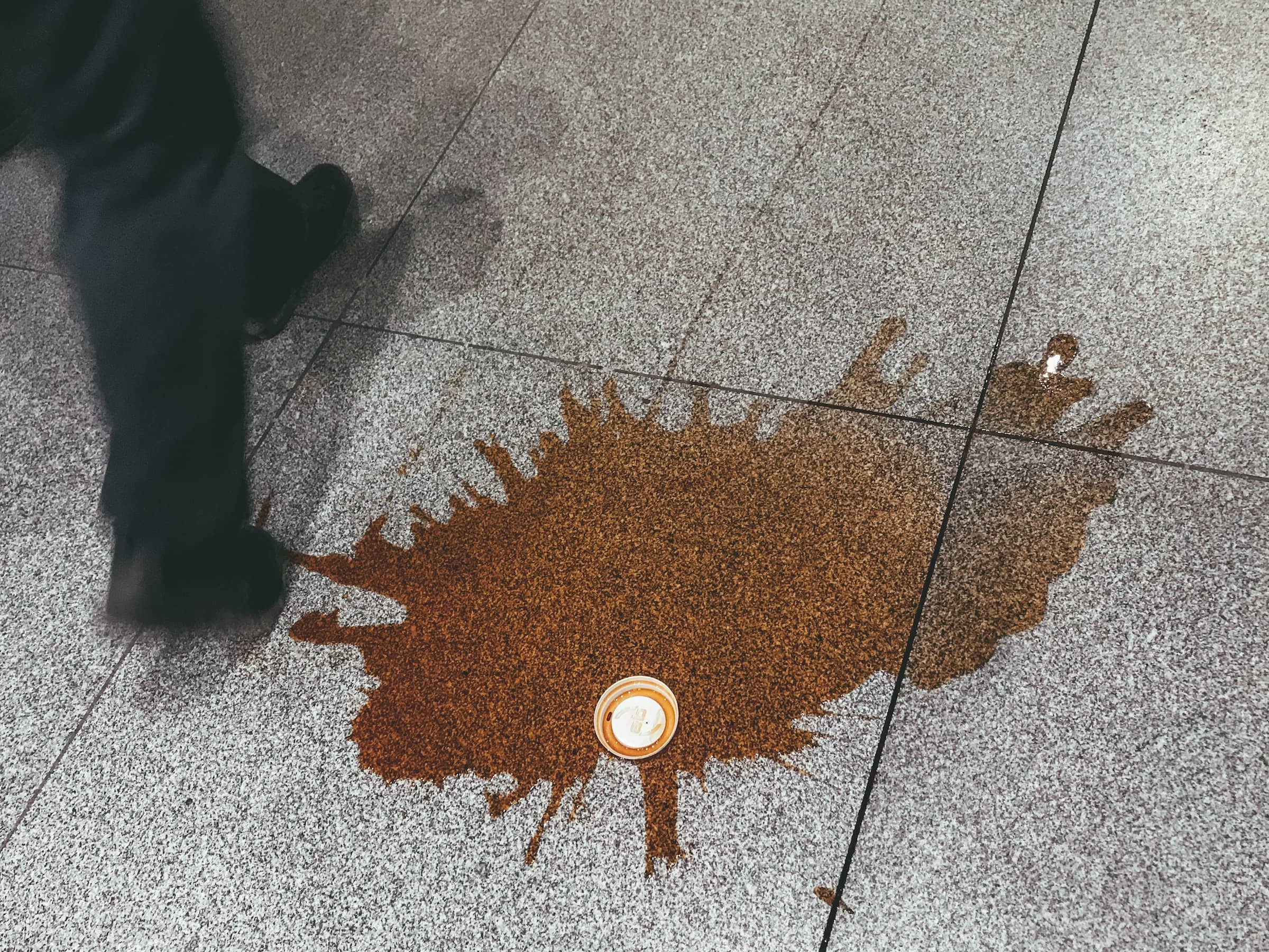 spilled coffee on ground