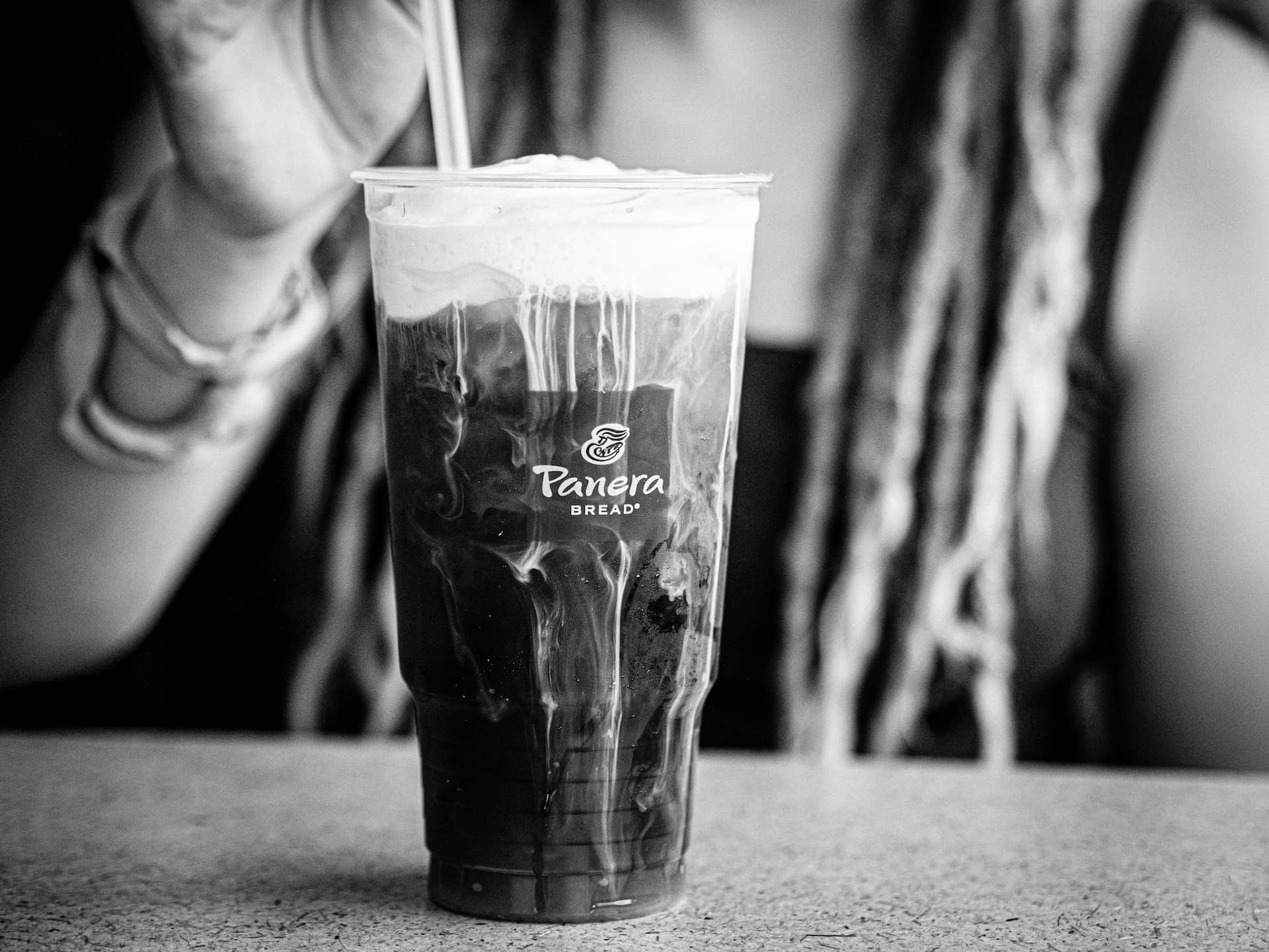 black and white picture of panera iced coffee