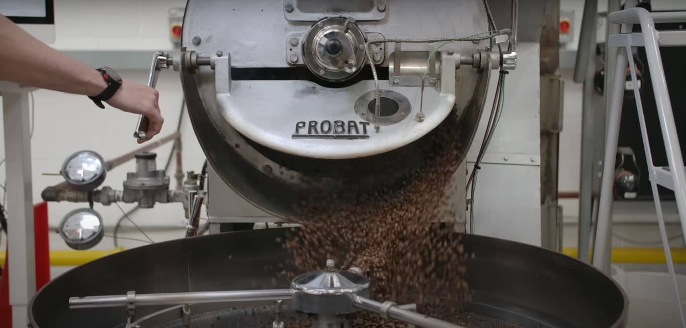 coffee roasting machine dumping beans